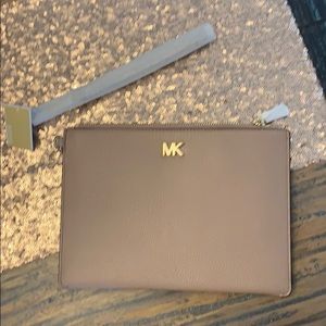 Brand new Michael Kors leather clutch in pale pink